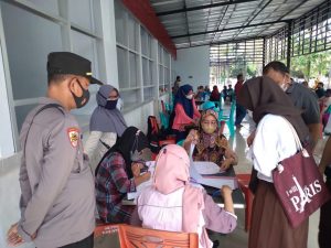 Tingkatkan Capaian Vaksinasi, Polres Gorontalo Gelar Vaksinasi Serentak Dan Bagikan Sembako