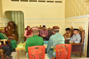 Pjs Bupati, Syukri Botutihe Disambut Upacara Adat Mopotilolo Di Telaga