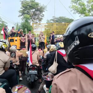 Guyuran Hujan Iringi Semangat Pramuka Gorontalo Dalam Konvoi Road To Peran Saka Nasional 2025